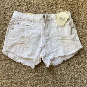 White destroyed denim shorts